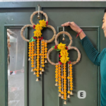 triple-circle-floral-toran-pair-with-marigold-bells-designer-festive-hanging-set-pair-of-3