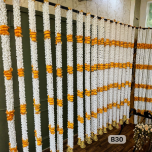 layered-marigold-style-garland-set-in-white-orange-wedding-stage-decor-pack-of-10-strings