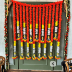 orange-marigold-toran-curtain-with-bell-tassels-grand-entrance-decoration