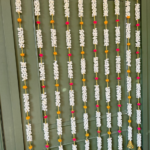 white-mongra-pom-pom-wall-door-hangings-pack-of-10-strings